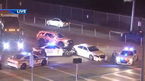 Police car crashes into white sedan in Miami Lakes